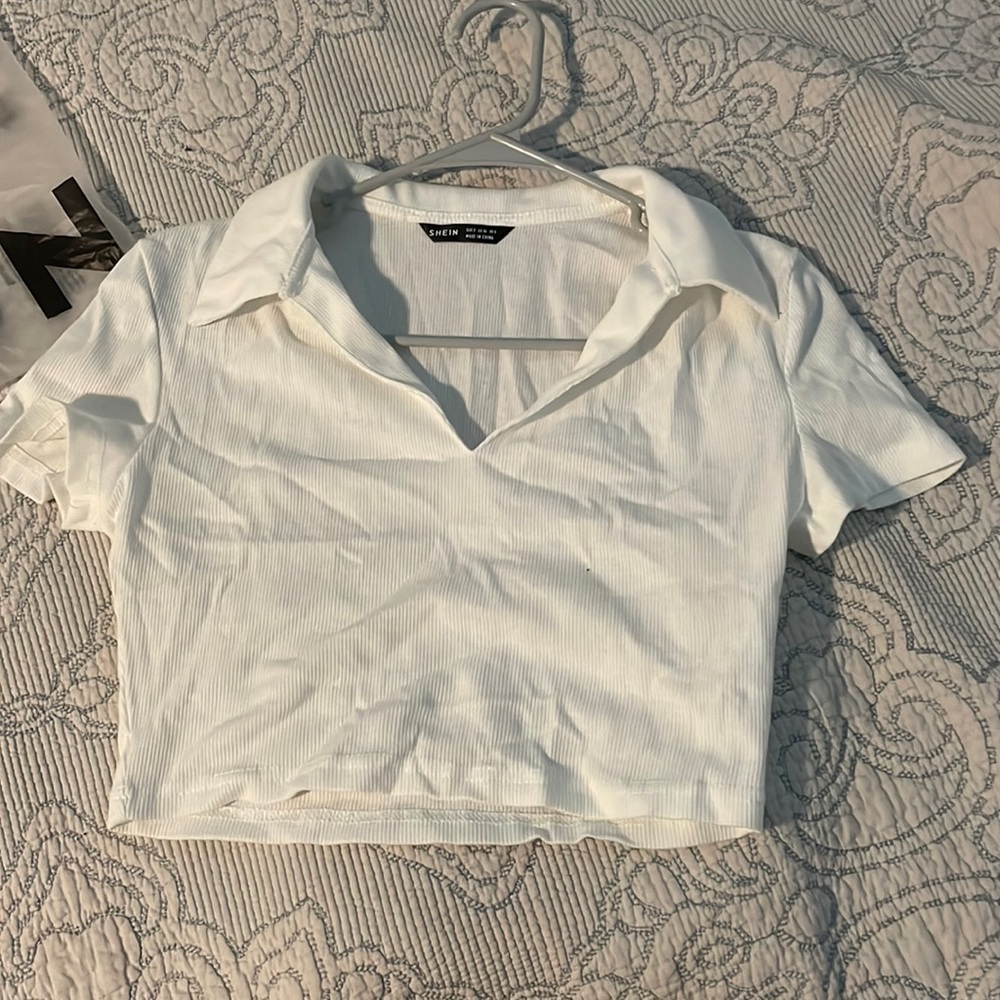 This is a shein white cropped collared top